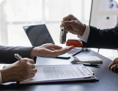 Handing over car keys at desk